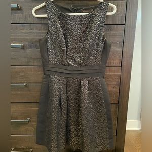 Great condition black and gold detail back zip dress.